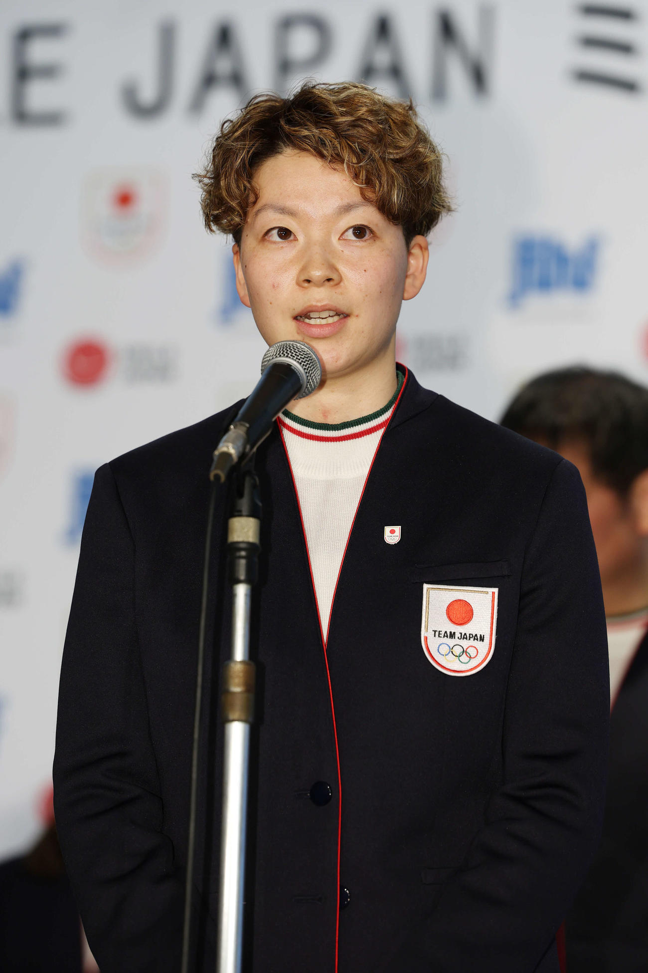 ミラノ・コルティナ五輪壮行会であいさつするスマイルジャパン小池主将（撮影・宮地輝）