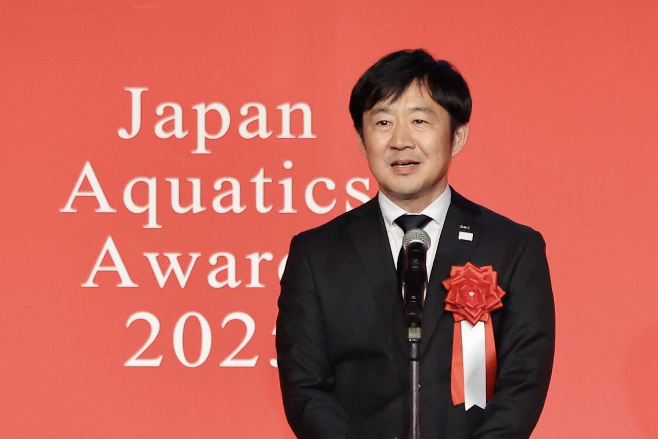あいさつするGMOクリック証券株式会社石村取締役（撮影・河田真司）