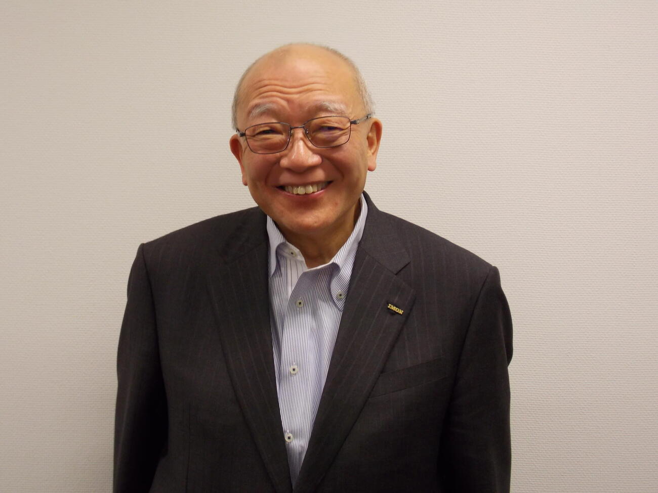 笑顔を見せる井門グループの井門義博社長（撮影・松本航）