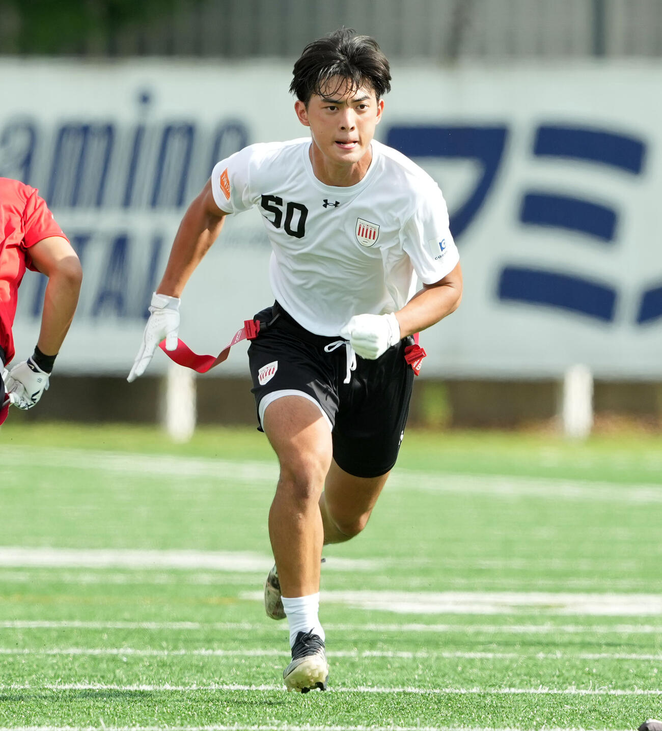 突進するフラッグフットボール男子日本代表・川崎航（撮影・たえ見朱実）