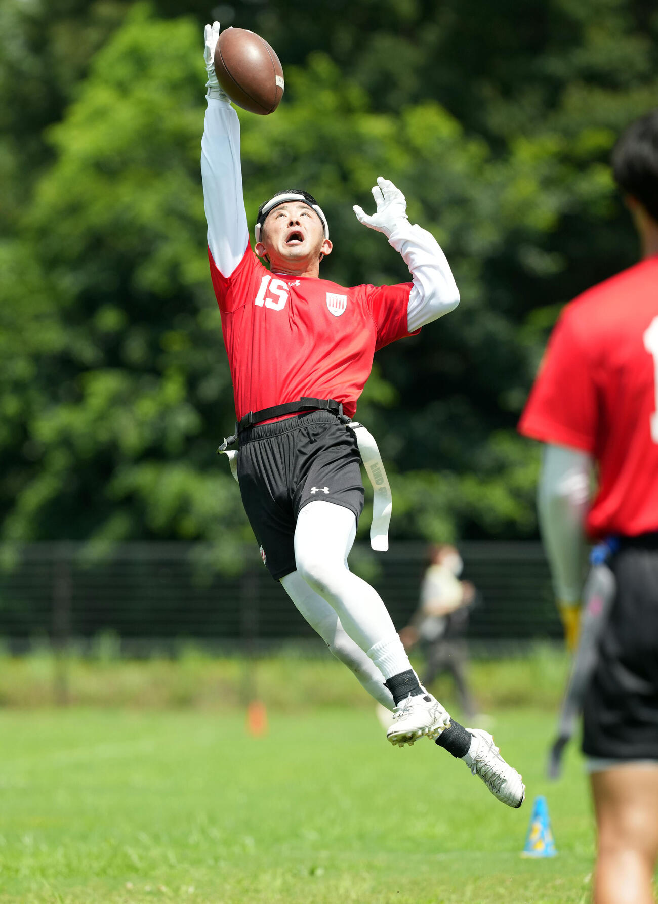 パスを受けるフラッグフットボール男子日本代表・植松遼平（撮影・たえ見朱実）