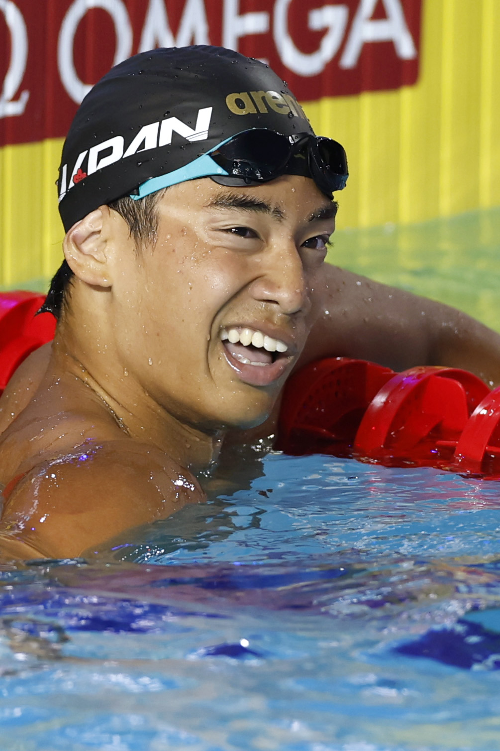 男子200メートル自由形決勝のレースを終え、悔しそうな表情の村佐達也。1分44秒76で4位だった＝アーバイン（共同）