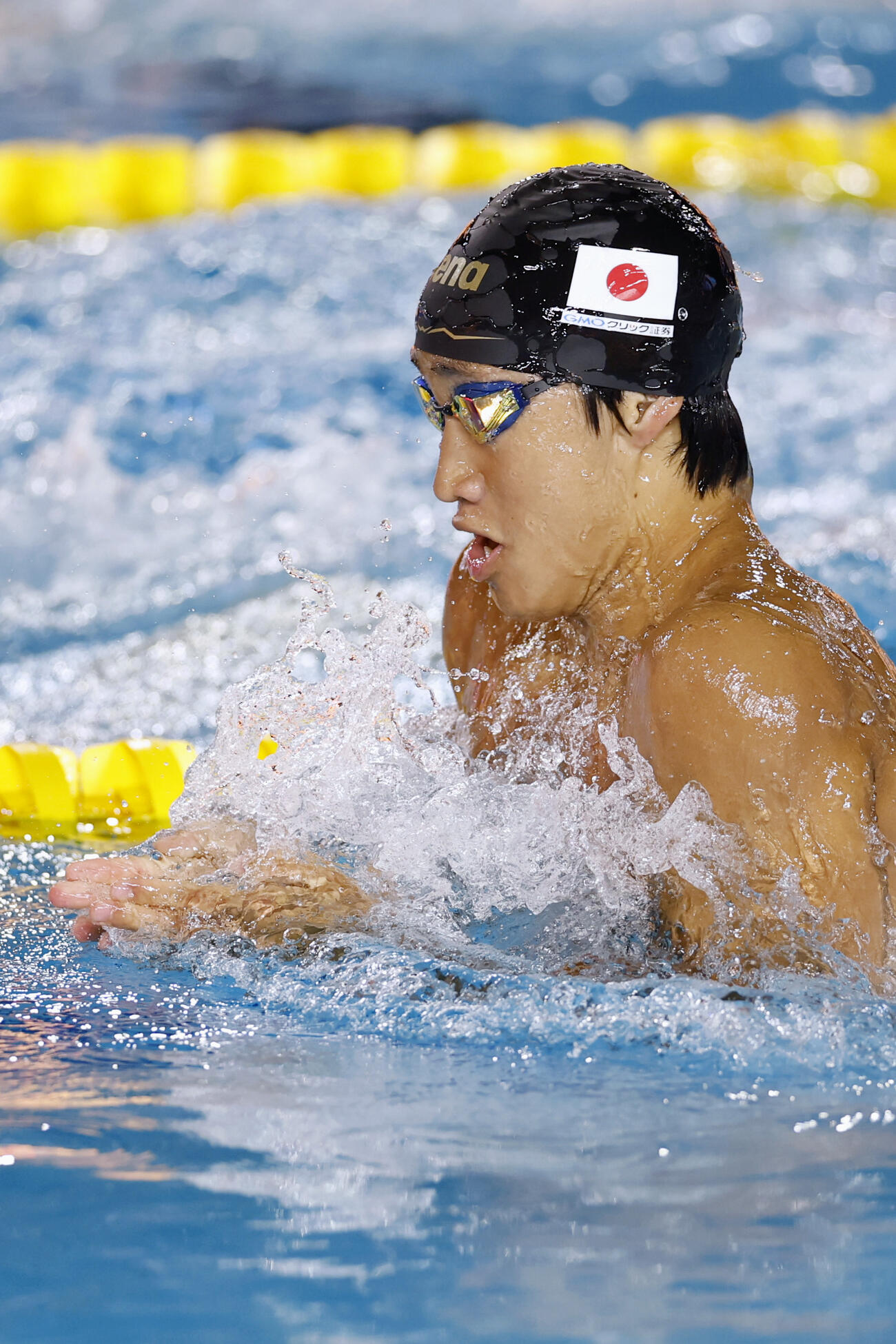 男子100メートル平泳ぎ決勝で力泳する大橋信。58秒54の日本新で2位に入った（共同）
