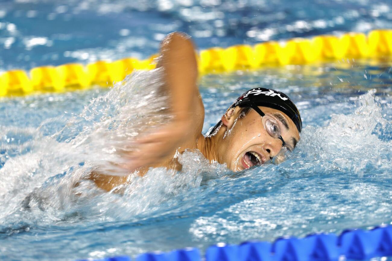 男子1500メートル自由形で力泳する今福和志。14分42秒59の日本新記録で2位に入った＝アーバイン（共同）