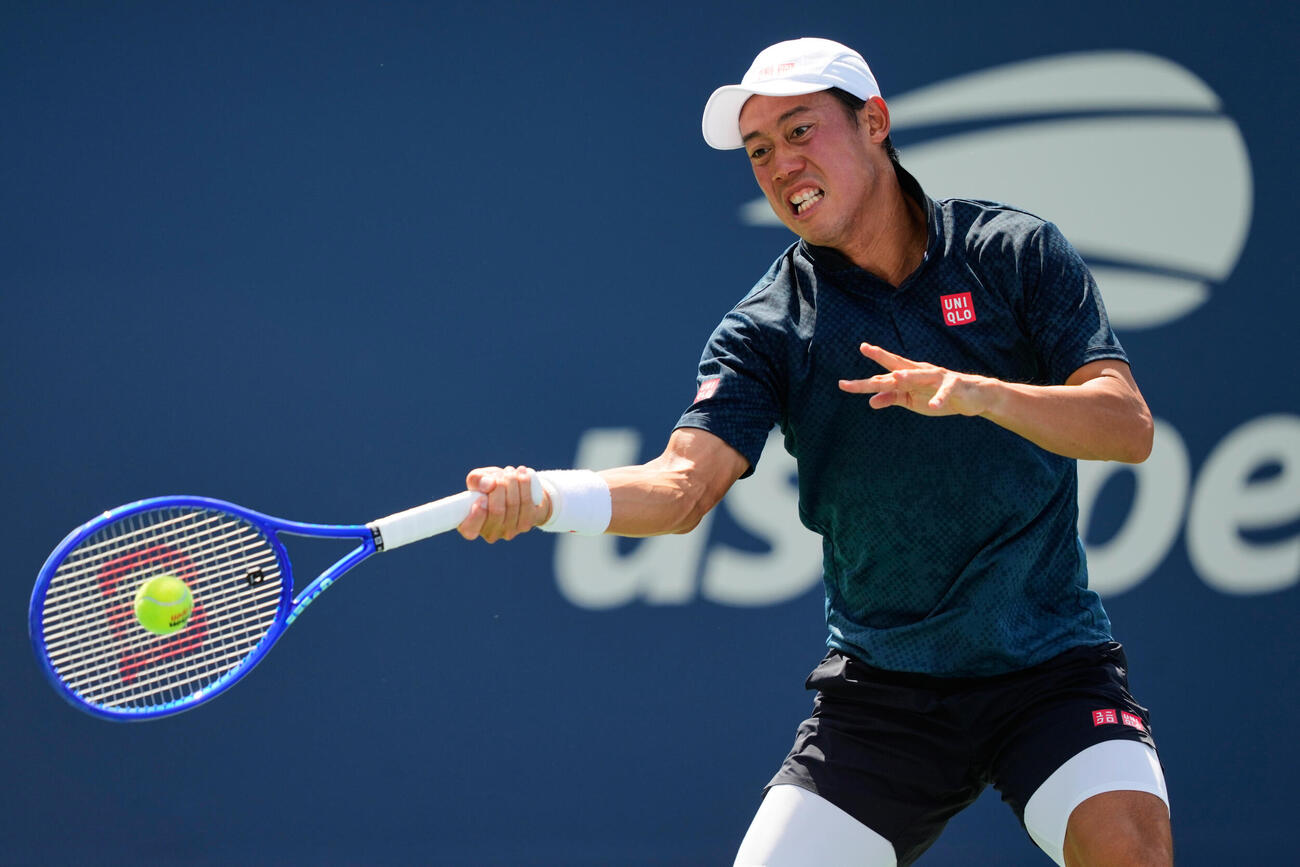 全米オープン予選1回戦でプレーする錦織圭（AP）