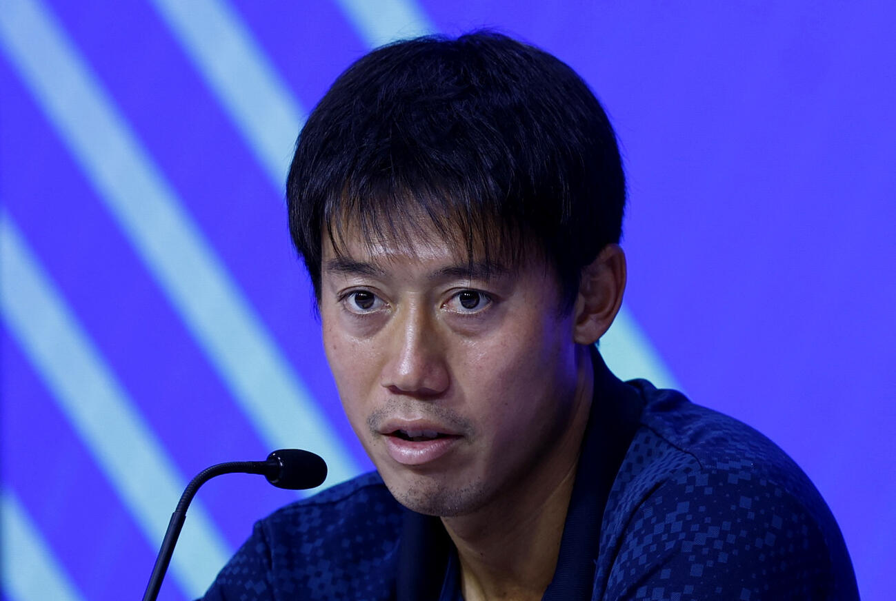記者会見を行う錦織圭（ロイター）