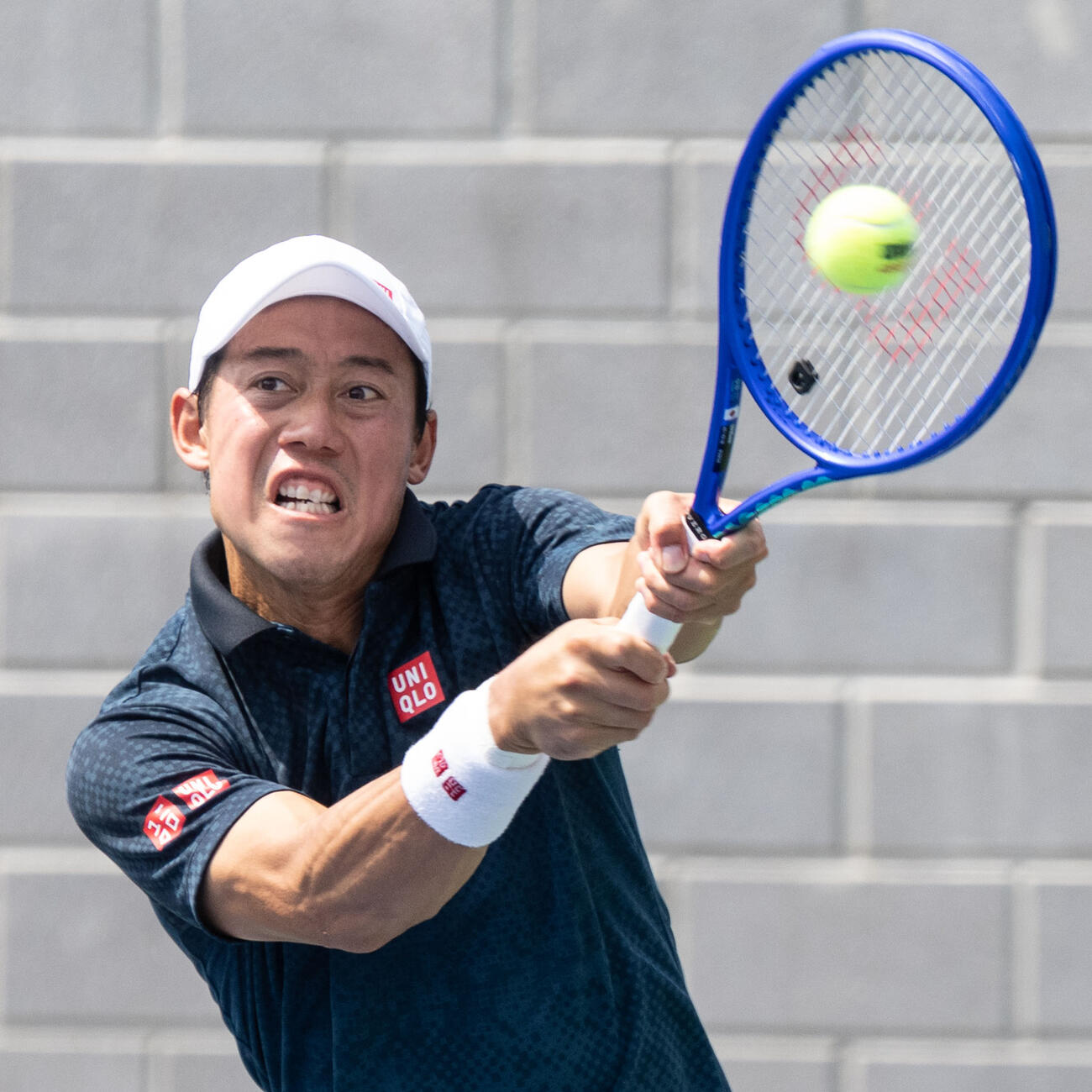 男子シングルス予選3回戦でプレーする錦織圭＝ニューヨーク（ゲッティ＝共同）