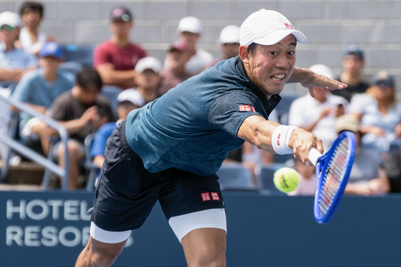 男子シングルス予選3回戦でプレーする錦織圭＝ニューヨーク（ゲッティ＝共同）