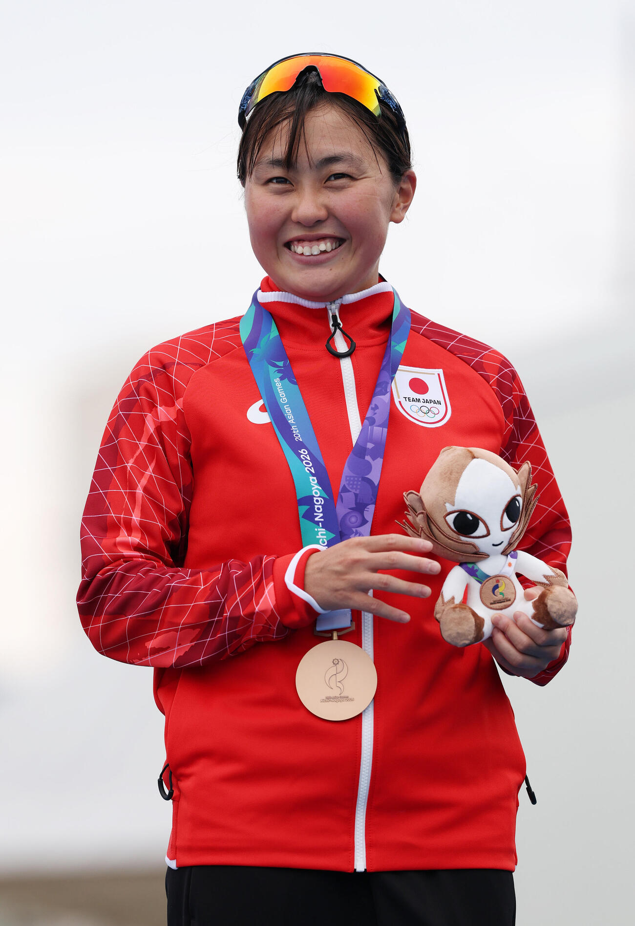 アジア大会トライアスロン女子で銅メダルを獲得し笑顔を見せる林愛望（撮影・宮地輝）