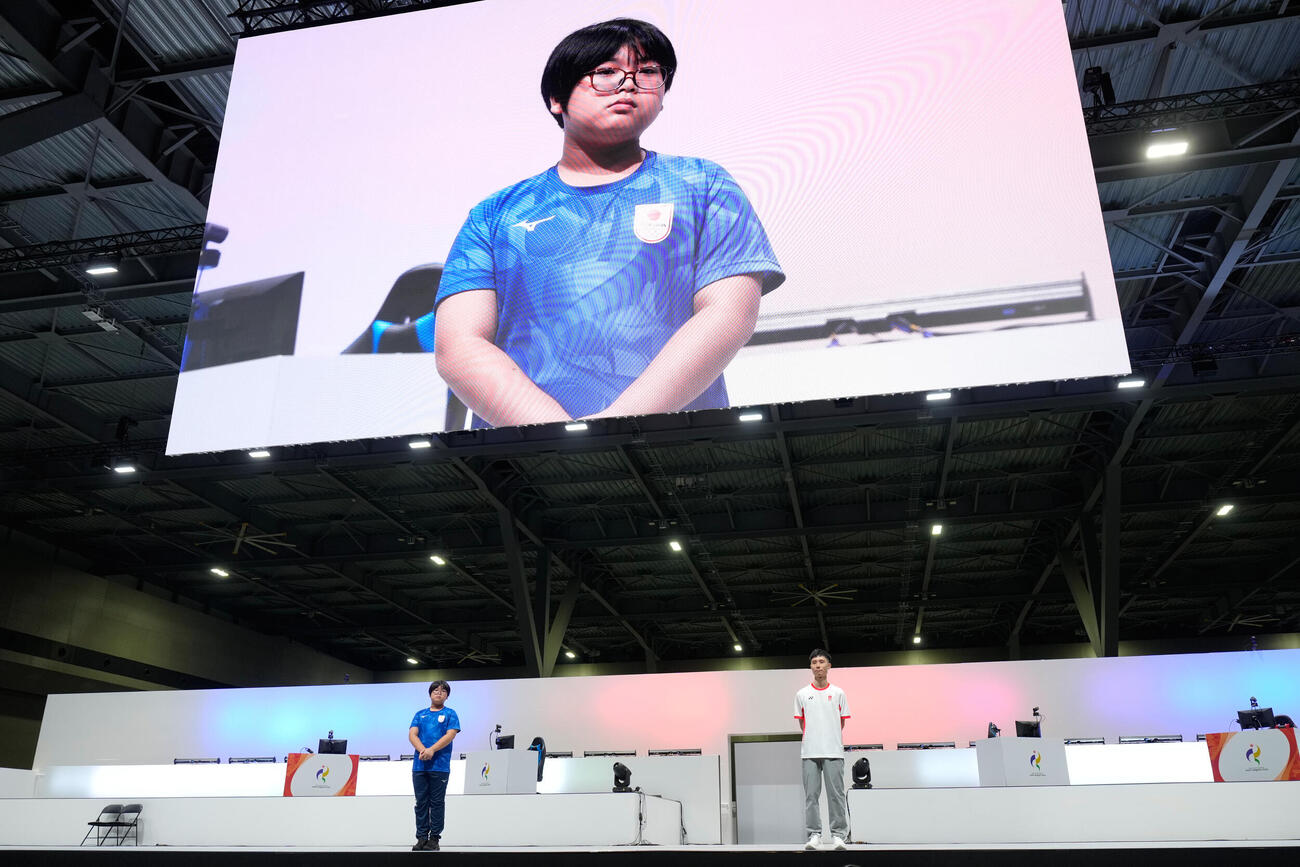 準々決勝での栗原悠輝（AP）