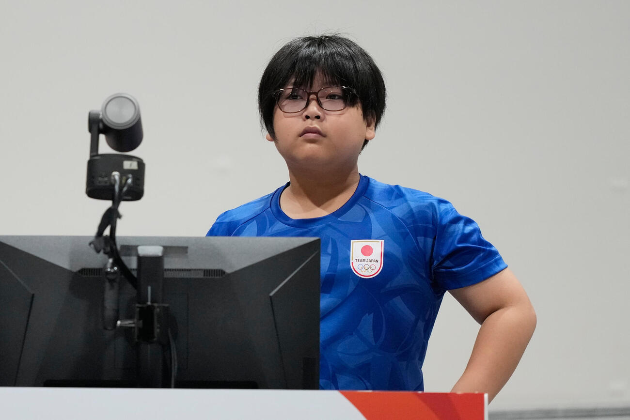 準々決勝での栗原悠輝（AP）