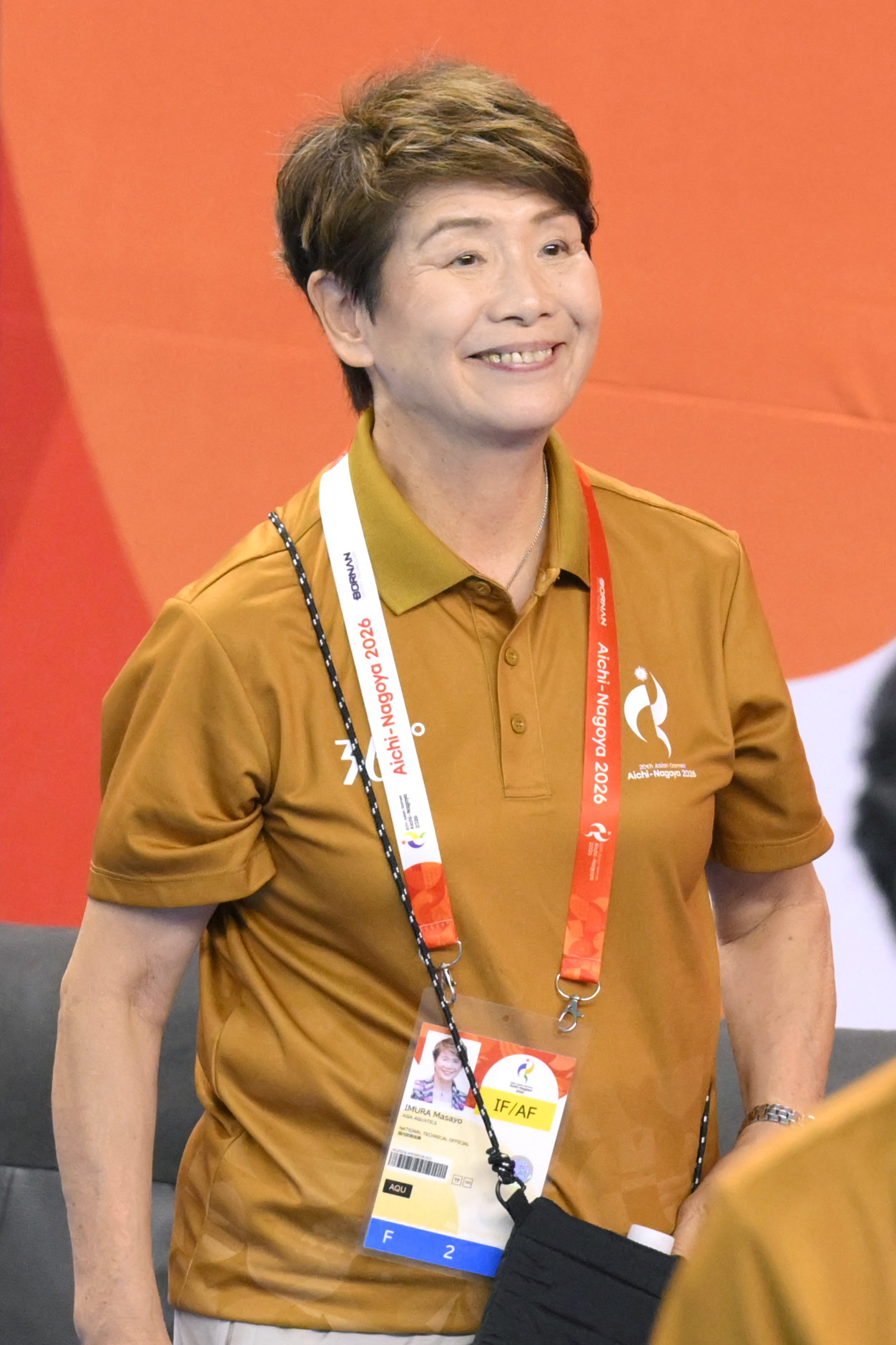 ASの会場でボランティアとして参加する井村雅代元日本代表ヘッドコーチ＝27日、浜松市総合水泳場(共同)