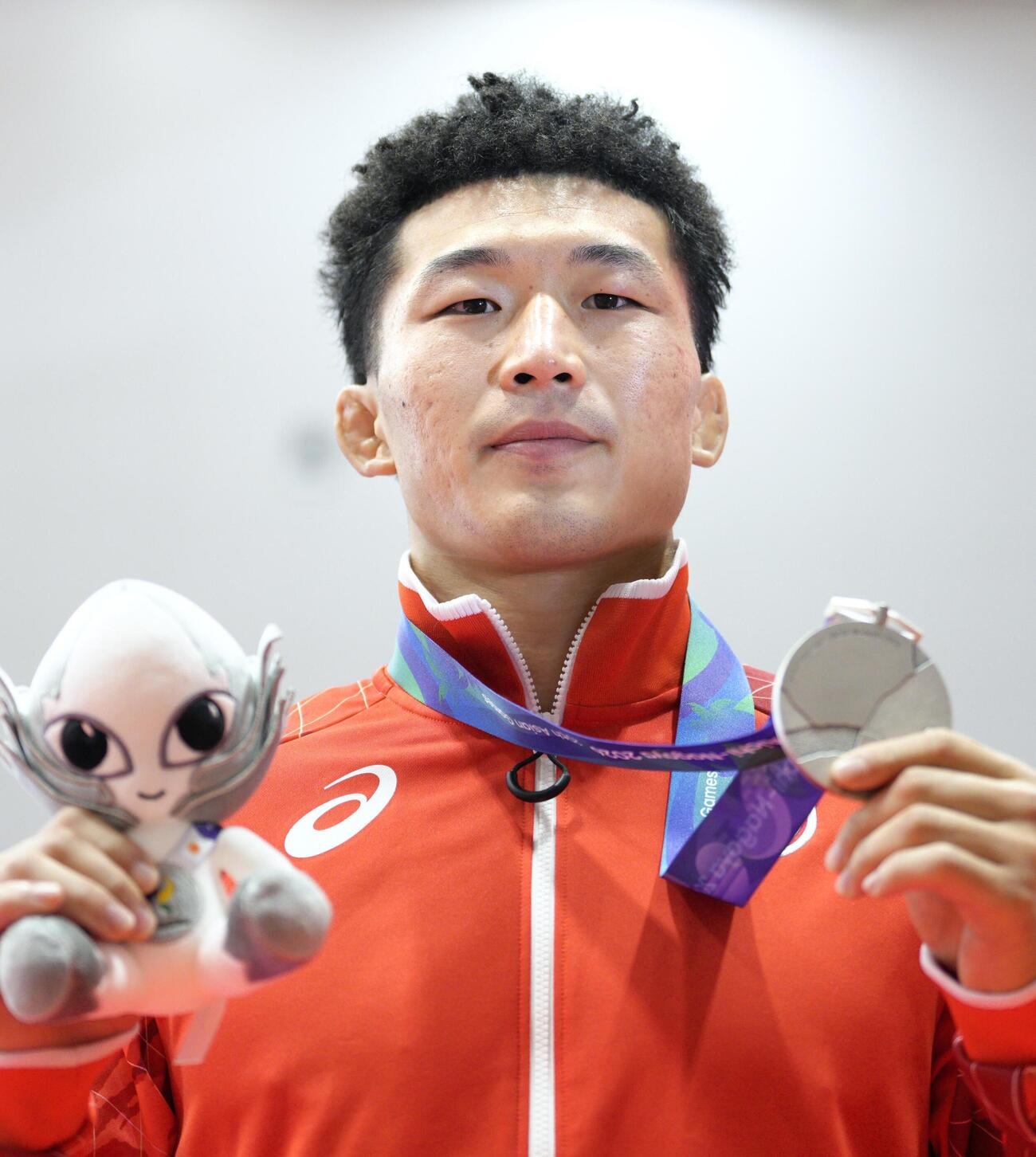 男子グレコローマン77キロ級で銀メダルを獲得した日下尚＝名古屋市稲永SC