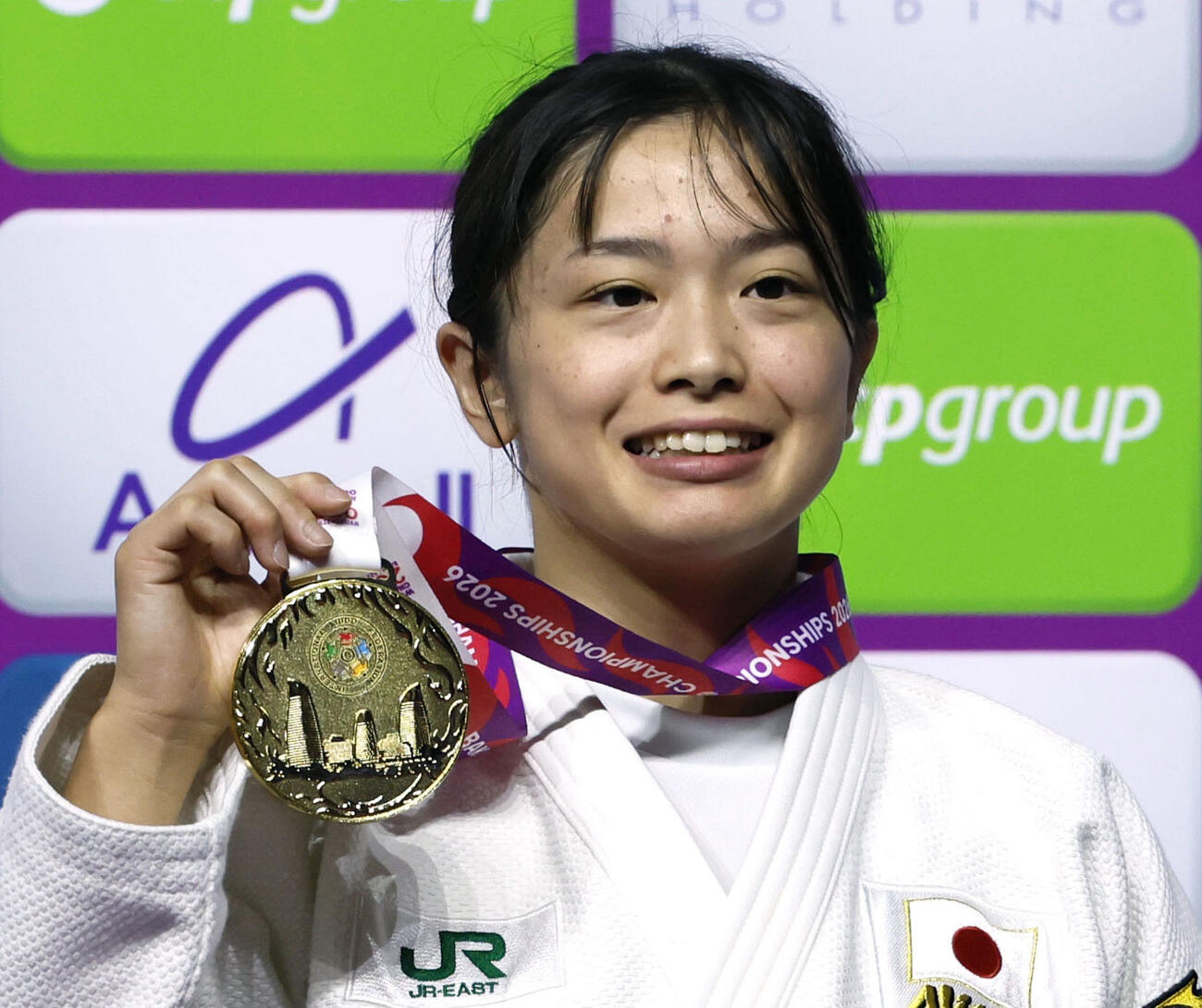 女子57キロ級で金メダルを獲得した大森朱莉（共同）
